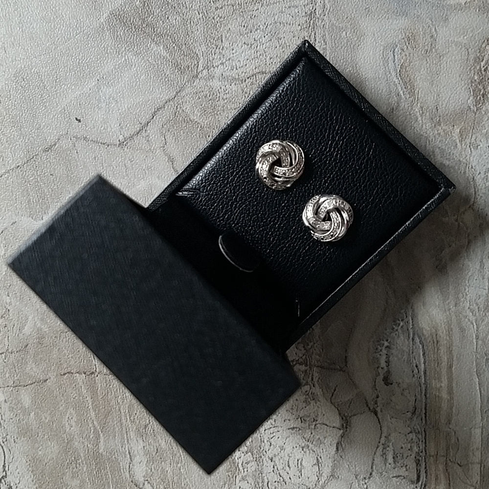 New! Diamond Love Knot Stud Earrings (1/10 ct. t.w.) in Sterling Silver